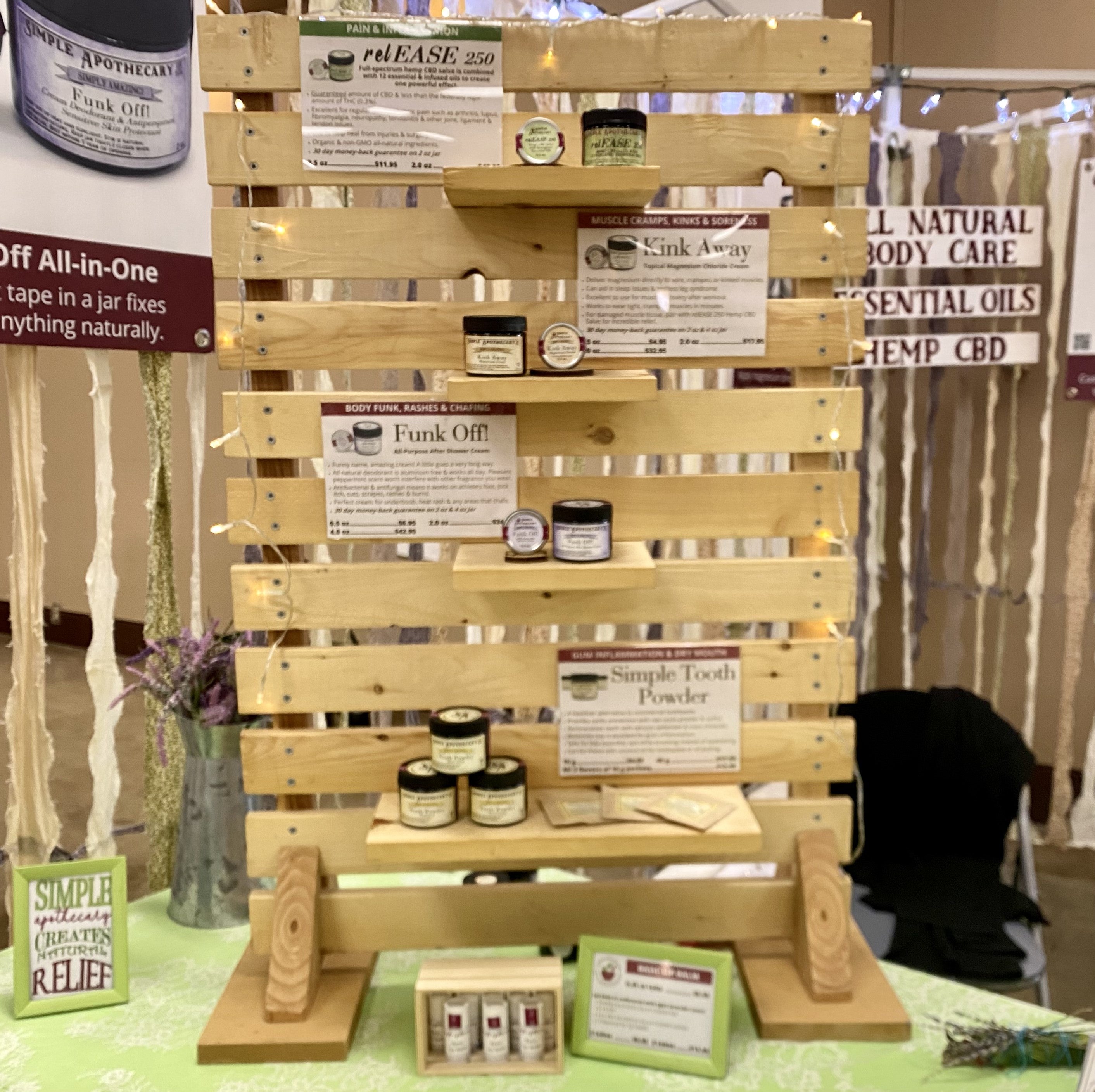 Simple Apothecary's natural remedies are displayed in the vendor booth. Located in Red Bluff, CA.