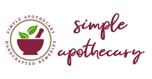 A mortar and pestle are at the heart of the logo, with the words Simple Apothecary and Handcrafted Remedies circling it. Stylish letters show Simple Apothecary to the right of the logo.